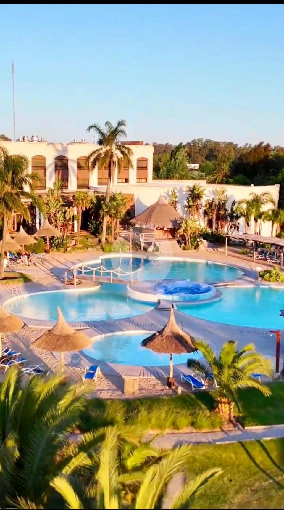 Sheraton Colonia Golf & Spa Resort Колония дел Сакременто Екстериор снимка The swimming pool at the hotel