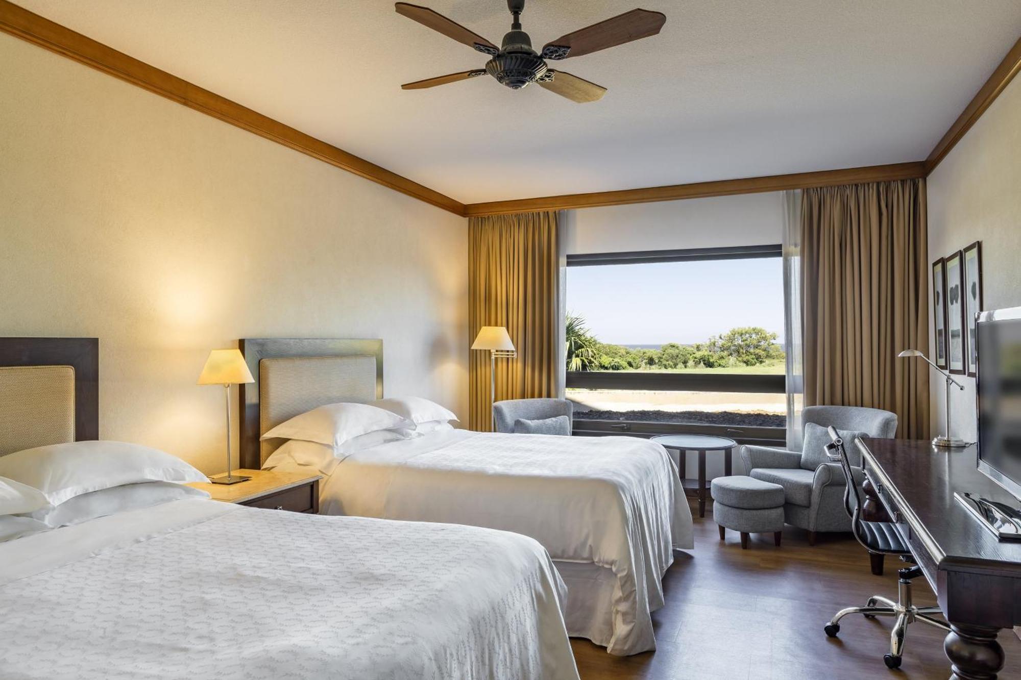 Sheraton Colonia Golf & Spa Resort Колония дел Сакременто Екстериор снимка A room at the hotel